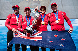 Skipper Phil Robertson (second from left) and crew are all smiles after winning the 2019 Open Match Racing World Championship (©Drew Malcolm/ChinaOne.Ningbo photo).